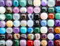 Different beautiful gemstones as background, top view Royalty Free Stock Photo