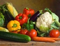 A vibrant assortment of fresh vegetables is displayed on a wooden surface Royalty Free Stock Photo
