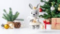 Handmade Crochet Bunny Toy Near Christmas Tree Royalty Free Stock Photo