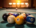 A close-up of a pool table with a neatly arranged rack of billiard balls, including the 1, 6, and 11 balls Royalty Free Stock Photo