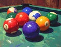 A collection of billiard balls positioned on a green pool table Royalty Free Stock Photo