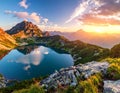 Mountain landscape featuring a serene alpine lake, likely in the Tatra Mountains Royalty Free Stock Photo