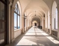 Arched corridor featuring a series of symmetrical arches supported by columns, creating a perspective view Royalty Free Stock Photo
