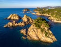 Aerial views of the rocks in the sea on a sunny day in the Costa Brava in Spain Royalty Free Stock Photo