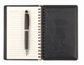 Open leather-bound notebook with lined pages on the left, featuring a silver and black pen Royalty Free Stock Photo