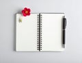 Spiral-bound notebook open on two blank pages Royalty Free Stock Photo