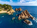 Aerial views of the rocks in the sea on a sunny day in the Costa Brava in Spain Royalty Free Stock Photo
