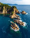 Aerial views of the rocks in the sea on a sunny day in the Costa Brava in Spain Royalty Free Stock Photo