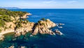 Aerial views of the rocks in the sea on a sunny day in the Costa Brava in Spain Royalty Free Stock Photo