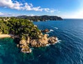 Aerial views of the rocks in the sea on a sunny day in the Costa Brava in Spain Royalty Free Stock Photo