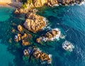 Aerial views of the rocks in the sea on a sunny day in the Costa Brava in Spain Royalty Free Stock Photo