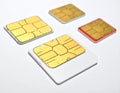 Four SIM cards are displayed on a white surface. Each card features a gold contact chip Royalty Free Stock Photo