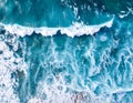 Aerial view of ocean waves crashing onto a shoreline Royalty Free Stock Photo