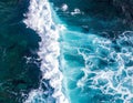 Aerial view of a powerful ocean wave crashing against the coastline Royalty Free Stock Photo
