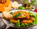 Pumpkin dish with a salad and biscuits Royalty Free Stock Photo