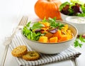 Pumpkin dish with a salad and biscuits Royalty Free Stock Photo