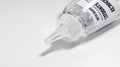 Super Glue Bottle Close Up, Transparent Adhesive, DIY Repair Concept, White Background Royalty Free Stock Photo