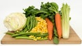 Fresh Vegetables on Cutting Board Carrots, Corn, Cabbage, Celery, Green Beans Royalty Free Stock Photo