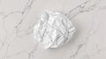 Crumpled Paper Ball on Marble Texture. Idea, Concept, Waste, Failure Royalty Free Stock Photo