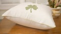 Shamrock Pillow on Wooden Table - St Patricks Day, Home Decor Royalty Free Stock Photo