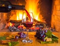 Art pouring wine by the fireplace Royalty Free Stock Photo