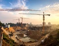 A construction site with multiple tower cranes Royalty Free Stock Photo