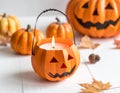 Cute artificial halloween orange pumpkin decoration made from paper and glass Royalty Free Stock Photo