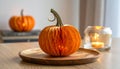 Cute artificial halloween orange pumpkin decoration made from paper and glass Royalty Free Stock Photo