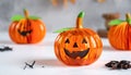 Cute artificial halloween orange pumpkin decoration made from paper and glass Royalty Free Stock Photo