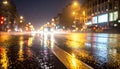 Rainstorm night in the big city, light from the shop windows reflected on the road Royalty Free Stock Photo