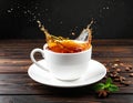 Cup of tea with splash on dark wooden background Royalty Free Stock Photo