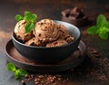 Chocolate coffee ice cream ball in a bowl with organic chocolate Royalty Free Stock Photo