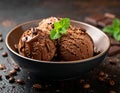 Chocolate coffee ice cream ball in a bowl with organic chocolate Royalty Free Stock Photo
