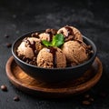 Chocolate coffee ice cream ball in a bowl with organic chocolate Royalty Free Stock Photo