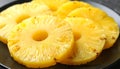Plate with fresh sliced pineapple, closeup Royalty Free Stock Photo