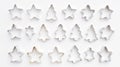 Christmas Cookie Cutters Stars and Fir Trees, Festive Baking Tools on White Background Royalty Free Stock Photo