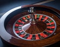 A roulette wheel with polished wood finish and metallic accents Royalty Free Stock Photo