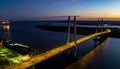 Cable-stayed Bridge At Dusk With Traffic And Harbor Lights Royalty Free Stock Photo