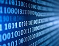 Binary code composed of sequences of ones and zeroes is displayed against a blue background. Royalty Free Stock Photo