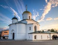 White Russian Orthodox church with golden onion dome under a partly cloudy sky Royalty Free Stock Photo