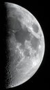 Half-moon phase with a detailed view of the lunar surface Royalty Free Stock Photo