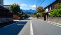 Photo of an empty street in a Japanese suburb, taken on a sunny day at eye level. Royalty Free Stock Photo