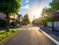 Photo of an empty street in a Japanese suburb, taken on a sunny day at eye level. Royalty Free Stock Photo