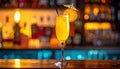 Yellow drink in champagne flut glass at the bar. There is an orange slice Royalty Free Stock Photo