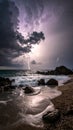 Dramatic coastal scene at night featuring a lightning storm over the ocean Royalty Free Stock Photo