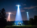 Three unidentified flying objects (UFOs) hover over a dense forest at night Royalty Free Stock Photo