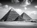The image shows two of the pyramids located in Giza, Egypt Royalty Free Stock Photo