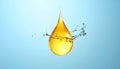 Drop of Omega-3 and water splash on light blue background Royalty Free Stock Photo