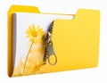 Yellow file folder with a zipper design, partially holding a stack of white papers Royalty Free Stock Photo