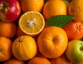 A variety of citrus fruits and apples are displayed Royalty Free Stock Photo